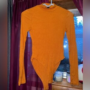 Orange long sleeve bodysuit. Forever 21